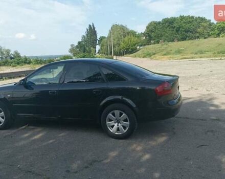 Черный Ауди А6, объемом двигателя 2.4 л и пробегом 400 тыс. км за 7500 $, фото 4 на Automoto.ua