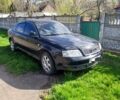 Черный Ауди А6, объемом двигателя 2 л и пробегом 250 тыс. км за 2600 $, фото 1 на Automoto.ua