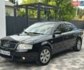 Черный Ауди А6, объемом двигателя 2 л и пробегом 280 тыс. км за 3850 $, фото 1 на Automoto.ua