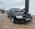 Черный Ауди А6, объемом двигателя 2.5 л и пробегом 258 тыс. км за 4050 $, фото 1 на Automoto.ua