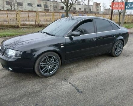 Черный Ауди А6, объемом двигателя 2.5 л и пробегом 296 тыс. км за 5100 $, фото 1 на Automoto.ua