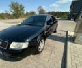 Черный Ауди А6, объемом двигателя 1.8 л и пробегом 285 тыс. км за 5000 $, фото 1 на Automoto.ua