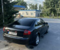 Черный Ауди А6, объемом двигателя 2 л и пробегом 243 тыс. км за 4500 $, фото 1 на Automoto.ua