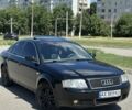Черный Ауди А6, объемом двигателя 2.5 л и пробегом 242 тыс. км за 4800 $, фото 1 на Automoto.ua