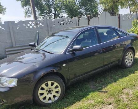 Черный Ауди А6, объемом двигателя 2.5 л и пробегом 405 тыс. км за 7000 $, фото 1 на Automoto.ua