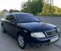 Черный Ауди А6, объемом двигателя 1.8 л и пробегом 250 тыс. км за 2900 $, фото 1 на Automoto.ua