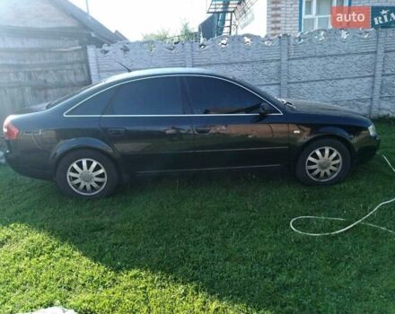 Черный Ауди А6, объемом двигателя 2 л и пробегом 446 тыс. км за 5300 $, фото 1 на Automoto.ua