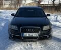 Черный Ауди А6, объемом двигателя 2.4 л и пробегом 280 тыс. км за 5500 $, фото 1 на Automoto.ua