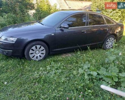 Черный Ауди А6, объемом двигателя 2.39 л и пробегом 298 тыс. км за 7300 $, фото 1 на Automoto.ua