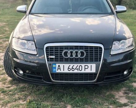 Черный Ауди А6, объемом двигателя 3.2 л и пробегом 287 тыс. км за 8000 $, фото 1 на Automoto.ua