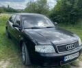 Черный Ауди А6, объемом двигателя 2.5 л и пробегом 400 тыс. км за 4400 $, фото 1 на Automoto.ua