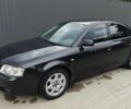 Черный Ауди А6, объемом двигателя 2.5 л и пробегом 241 тыс. км за 4900 $, фото 1 на Automoto.ua