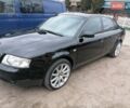 Черный Ауди А6, объемом двигателя 1.8 л и пробегом 175 тыс. км за 6200 $, фото 1 на Automoto.ua