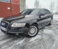 Черный Ауди А6, объемом двигателя 2 л и пробегом 323 тыс. км за 6999 $, фото 1 на Automoto.ua