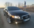 Черный Ауди А6, объемом двигателя 2 л и пробегом 300 тыс. км за 6500 $, фото 1 на Automoto.ua