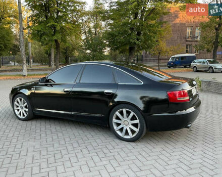 Черный Ауди А6, объемом двигателя 2.4 л и пробегом 230 тыс. км за 7000 $, фото 1 на Automoto.ua