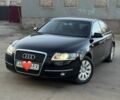 Черный Ауди А6, объемом двигателя 2.4 л и пробегом 245 тыс. км за 7700 $, фото 1 на Automoto.ua