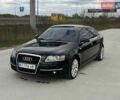 Черный Ауди А6, объемом двигателя 2.39 л и пробегом 280 тыс. км за 5200 $, фото 1 на Automoto.ua