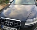 Черный Ауди А6, объемом двигателя 2.4 л и пробегом 308 тыс. км за 6800 $, фото 1 на Automoto.ua