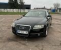 Черный Ауди А6, объемом двигателя 2 л и пробегом 362 тыс. км за 7000 $, фото 1 на Automoto.ua