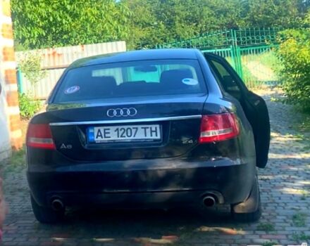 Черный Ауди А6, объемом двигателя 2.4 л и пробегом 400 тыс. км за 7000 $, фото 1 на Automoto.ua