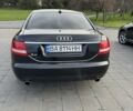Черный Ауди А6, объемом двигателя 2.4 л и пробегом 261 тыс. км за 9500 $, фото 1 на Automoto.ua