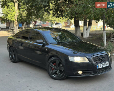 Черный Ауди А6, объемом двигателя 1.98 л и пробегом 299 тыс. км за 7000 $, фото 1 на Automoto.ua