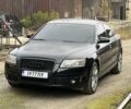 Черный Ауди А6, объемом двигателя 2 л и пробегом 253 тыс. км за 6999 $, фото 1 на Automoto.ua