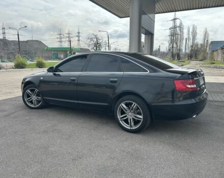 Черный Ауди А6, объемом двигателя 2.4 л и пробегом 305 тыс. км за 7800 $, фото 1 на Automoto.ua