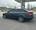 Черный Ауди А6, объемом двигателя 2.4 л и пробегом 305 тыс. км за 7800 $, фото 1 на Automoto.ua
