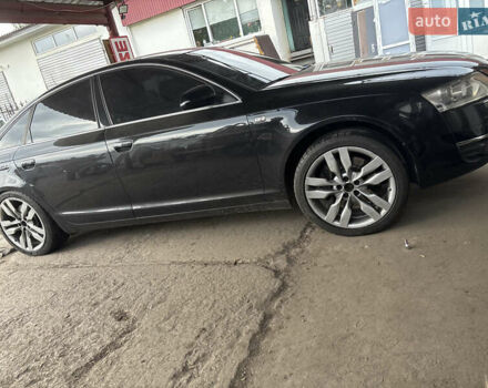Черный Ауди А6, объемом двигателя 4.2 л и пробегом 320 тыс. км за 10500 $, фото 1 на Automoto.ua