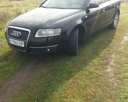 Черный Ауди А6, объемом двигателя 2.4 л и пробегом 225 тыс. км за 8200 $, фото 1 на Automoto.ua