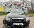 Черный Ауди А6, объемом двигателя 2.39 л и пробегом 396 тыс. км за 7500 $, фото 1 на Automoto.ua