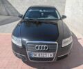 Черный Ауди А6, объемом двигателя 2 л и пробегом 331 тыс. км за 6500 $, фото 1 на Automoto.ua