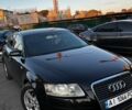 Черный Ауди А6, объемом двигателя 2 л и пробегом 329 тыс. км за 9000 $, фото 1 на Automoto.ua