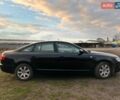Черный Ауди А6, объемом двигателя 2 л и пробегом 340 тыс. км за 7500 $, фото 1 на Automoto.ua