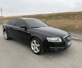 Черный Ауди А6, объемом двигателя 2.4 л и пробегом 260 тыс. км за 7000 $, фото 1 на Automoto.ua