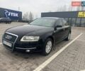 Черный Ауди А6, объемом двигателя 2.39 л и пробегом 308 тыс. км за 6500 $, фото 1 на Automoto.ua