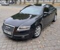 Черный Ауди А6, объемом двигателя 2 л и пробегом 395 тыс. км за 7400 $, фото 1 на Automoto.ua