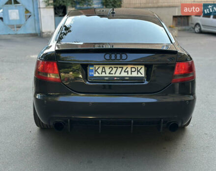 Черный Ауди А6, объемом двигателя 1.98 л и пробегом 299 тыс. км за 7000 $, фото 4 на Automoto.ua