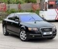 Черный Ауди А6, объемом двигателя 2.39 л и пробегом 282 тыс. км за 5650 $, фото 1 на Automoto.ua
