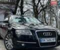 Черный Ауди А6, объемом двигателя 1.98 л и пробегом 248 тыс. км за 6900 $, фото 1 на Automoto.ua