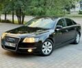 Черный Ауди А6, объемом двигателя 7 л и пробегом 239 тыс. км за 4003 $, фото 1 на Automoto.ua