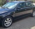 Черный Ауди А6, объемом двигателя 2 л и пробегом 220 тыс. км за 3500 $, фото 1 на Automoto.ua