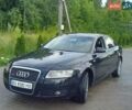 Черный Ауди А6, объемом двигателя 2.4 л и пробегом 260 тыс. км за 7600 $, фото 1 на Automoto.ua