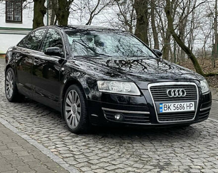 Черный Ауди А6, объемом двигателя 2 л и пробегом 248 тыс. км за 7600 $, фото 1 на Automoto.ua