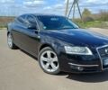 Черный Ауди А6, объемом двигателя 3 л и пробегом 265 тыс. км за 8999 $, фото 1 на Automoto.ua