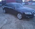 Черный Ауди А6, объемом двигателя 2 л и пробегом 405 тыс. км за 7000 $, фото 1 на Automoto.ua
