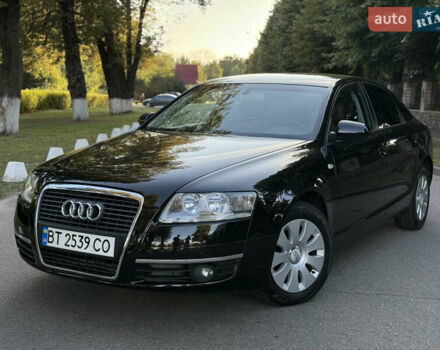 Черный Ауди А6, объемом двигателя 2 л и пробегом 265 тыс. км за 9550 $, фото 1 на Automoto.ua