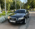 Черный Ауди А6, объемом двигателя 2 л и пробегом 400 тыс. км за 8000 $, фото 1 на Automoto.ua